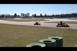 A future racer doing some lead-follow laps in a kart.